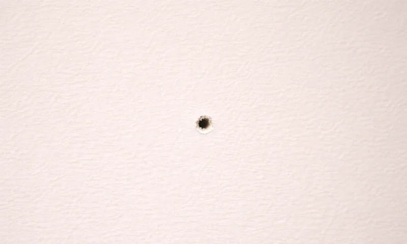 How to Repair a Small Hole in Drywall (Nail Holes & Tiny Damage) How to Repair a Small Hole in Drywall (Nail Holes & Tiny Damage)